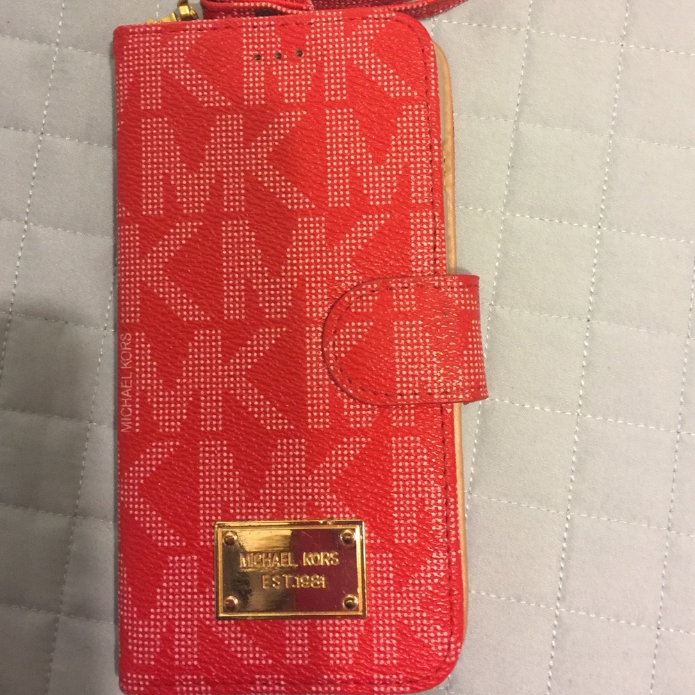 Michael Kors red cell phone case/ wallet .
